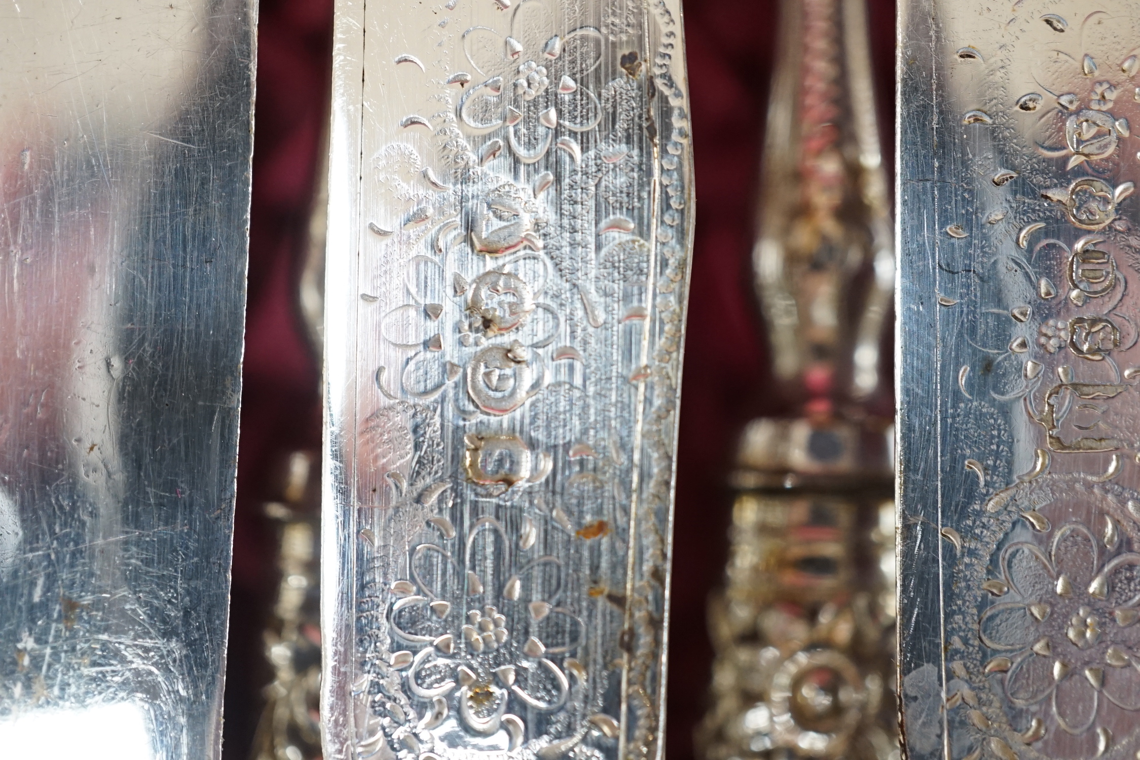 Six pairs of George V mother of pearl handled silver dessert eaters, Elkington & Co, Birmingham, 1912 and a cased set of twelve pairs of mother of pearl handled silver plated dessert eaters.